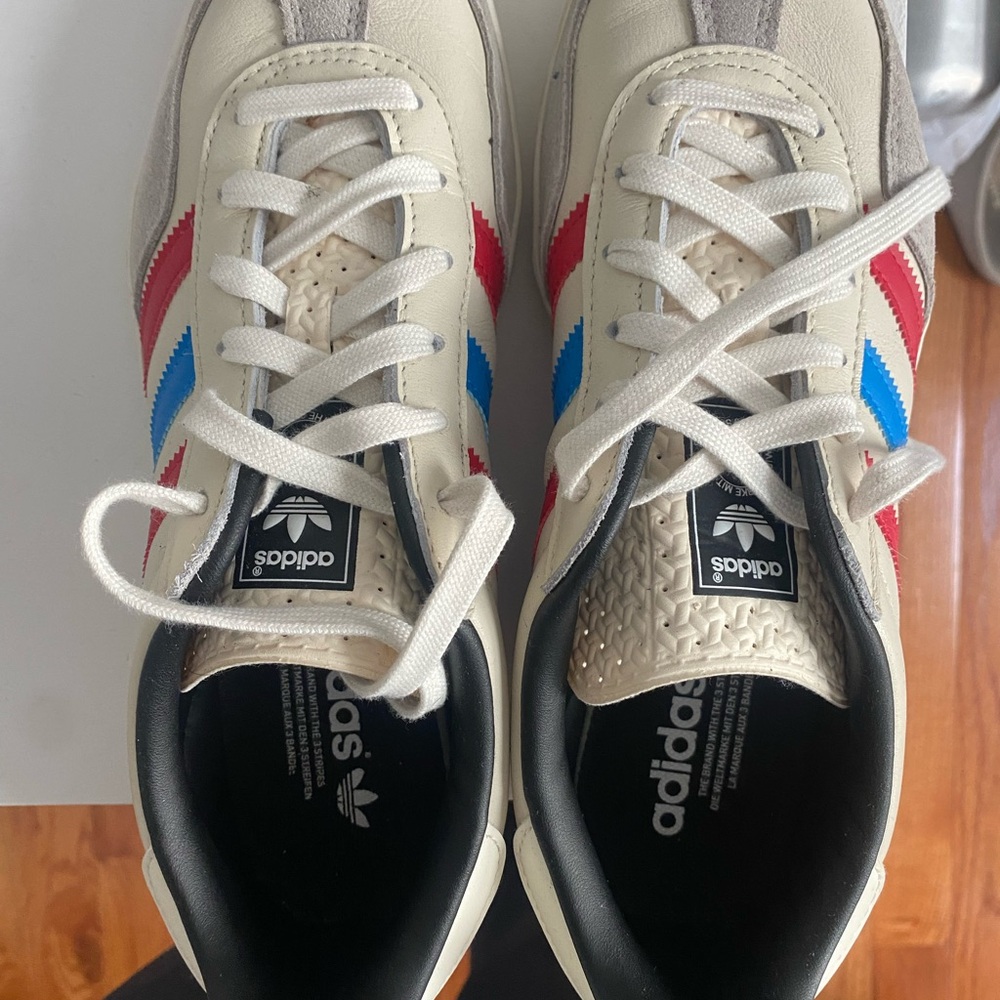 Adidas Beige Sneakers with Red and Blue Accents